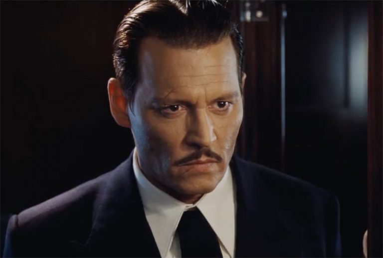 Johnny Depp u insertu iz filma "Ubistvo u Orient Expressu"